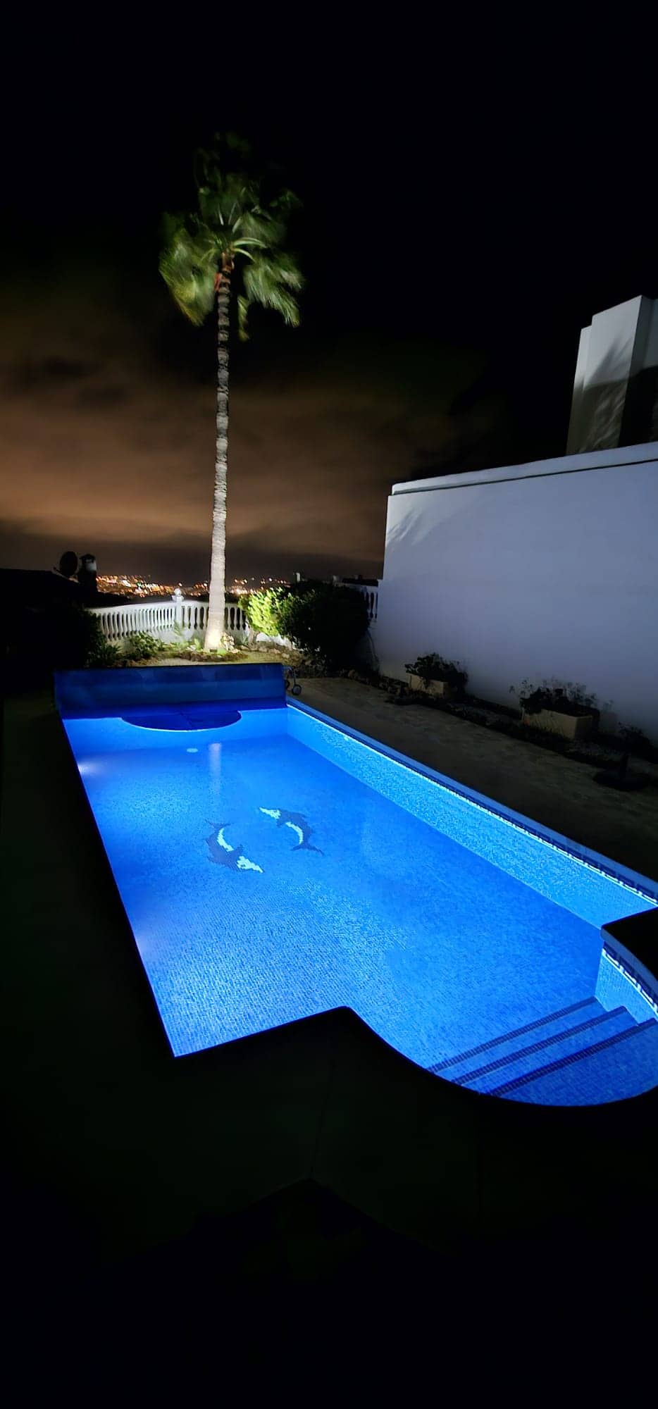 Villa with private pool at night